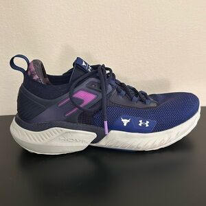 Slightly used Dwane Johnson blue and purple under armour men’s tennis shoes.